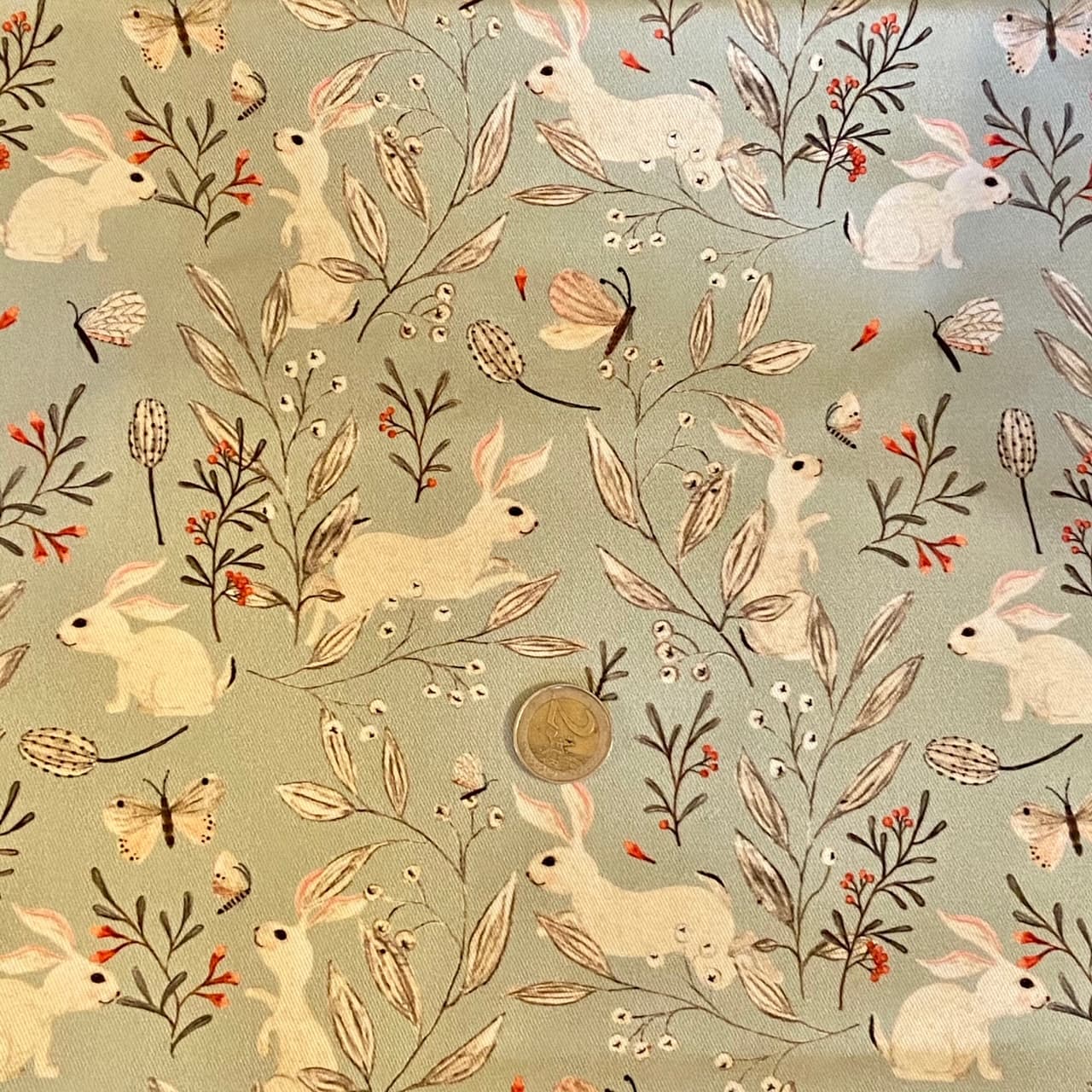 Tissu petits lapins fond gris bleu