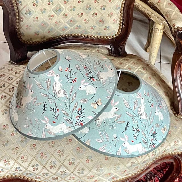 Fabric featuring small rabbits on a grey-blue background, view 6