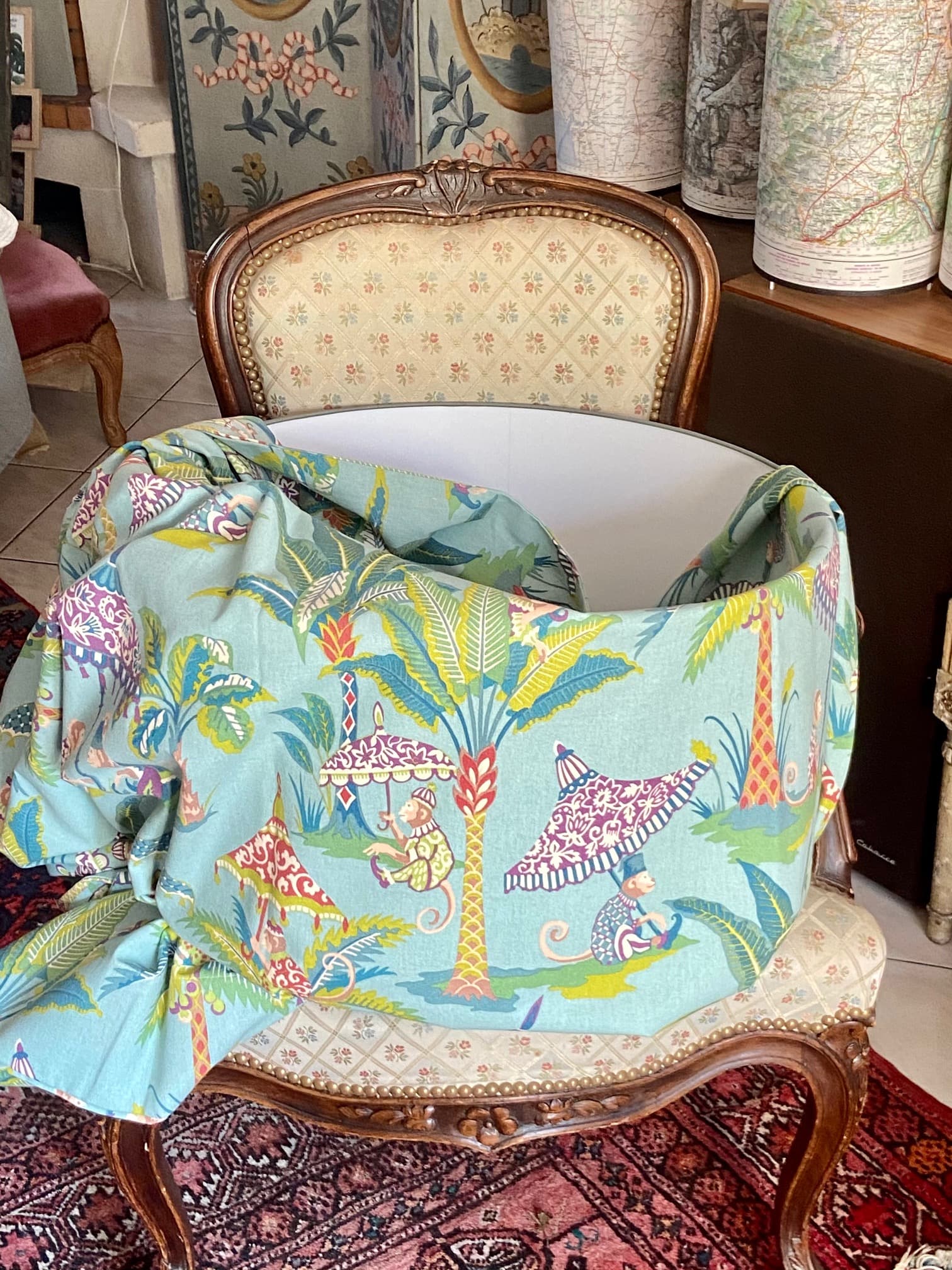 Fabric featuring monkeys and a parasol on a blue background, view 4