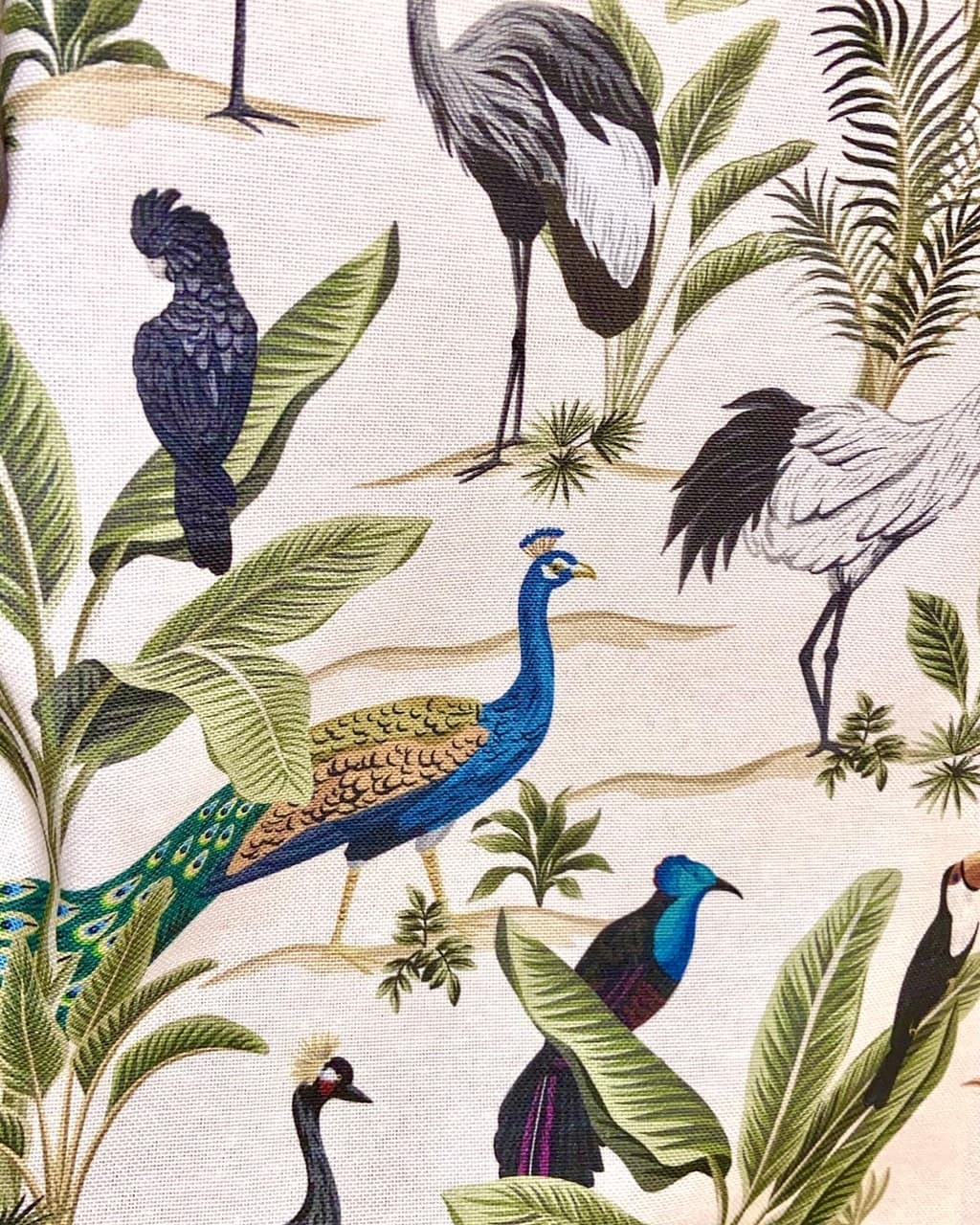 Exotic fabric featuring peacocks and palm trees, view 2