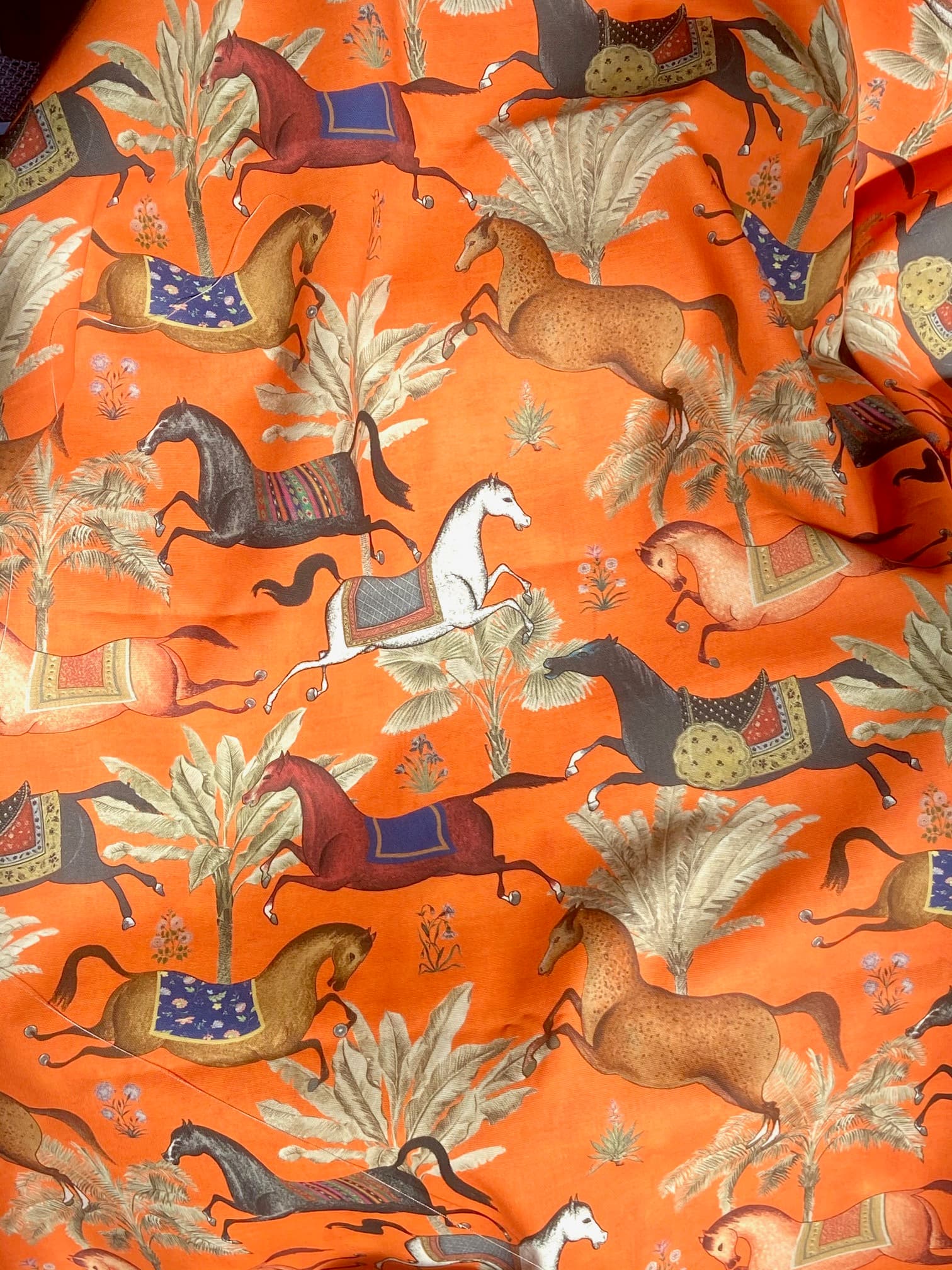 Tissu "chevaux arabes" fond orange