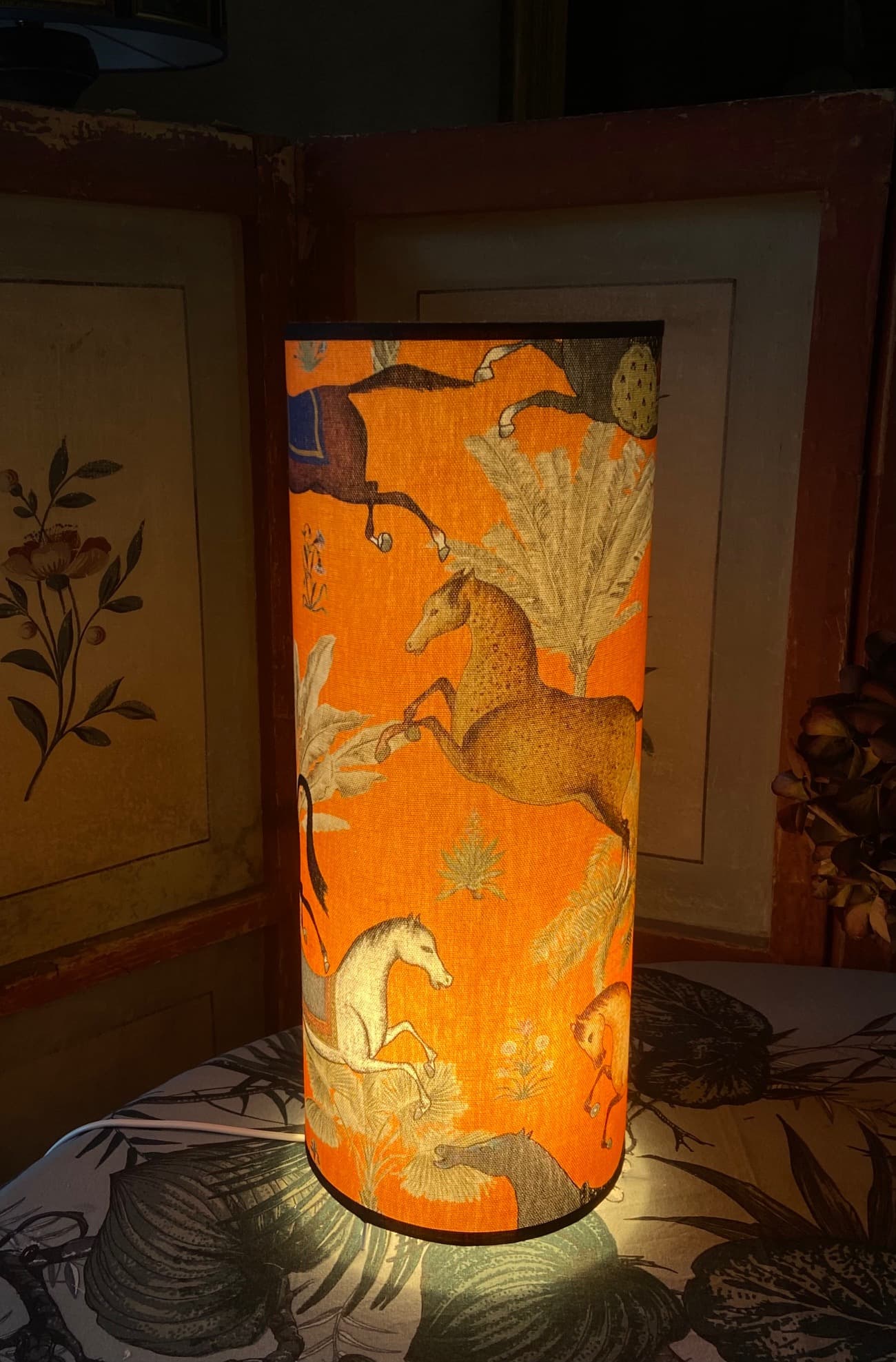 ‘Arabian horses’ fabric on an orange background, view 2