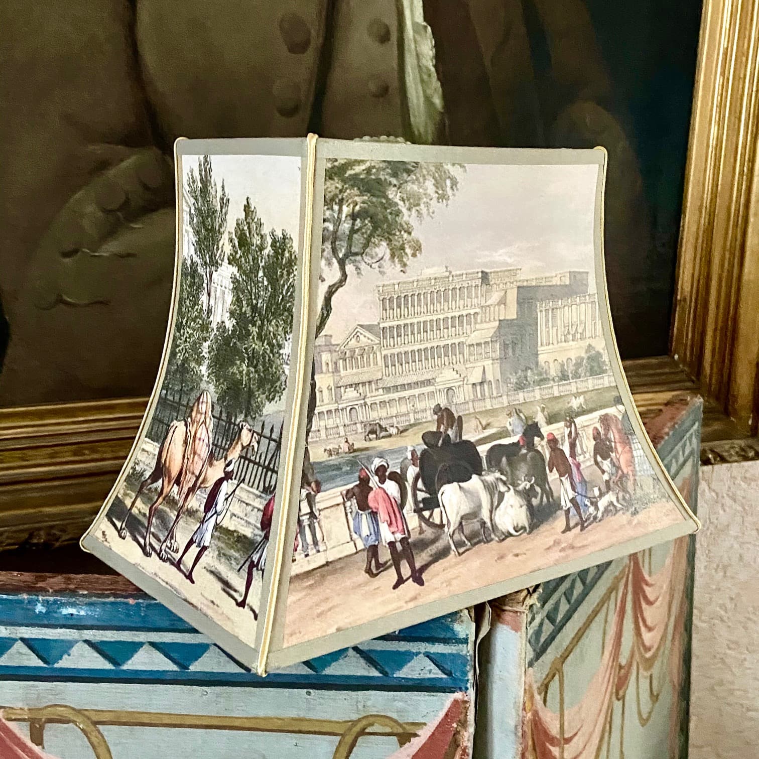 pagoda-style lampshades featuring engravings of towns or countries, view 2