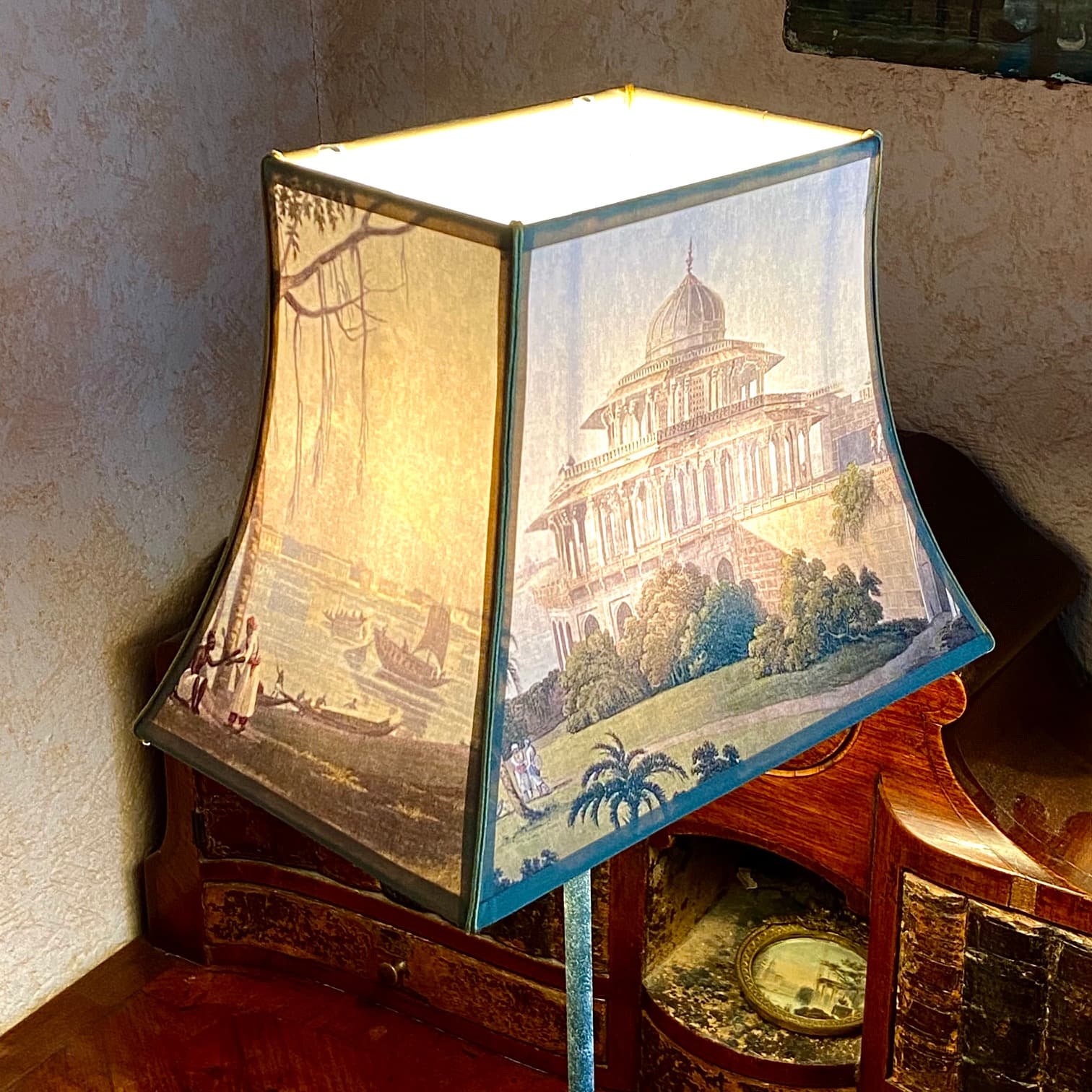 pagoda-style lampshades featuring engravings of towns or countries, view 7