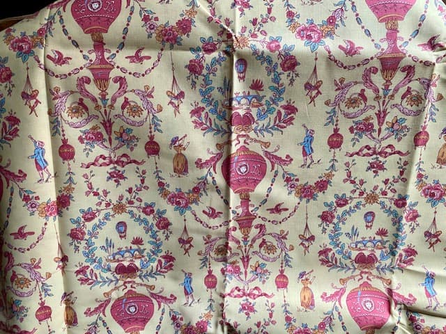 Toile de Jouy fabric in a pink pattern on a cream background, view 3