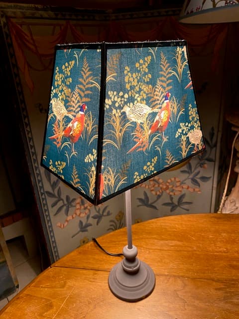 Fabric featuring pheasants on a duck-blue background, view 2