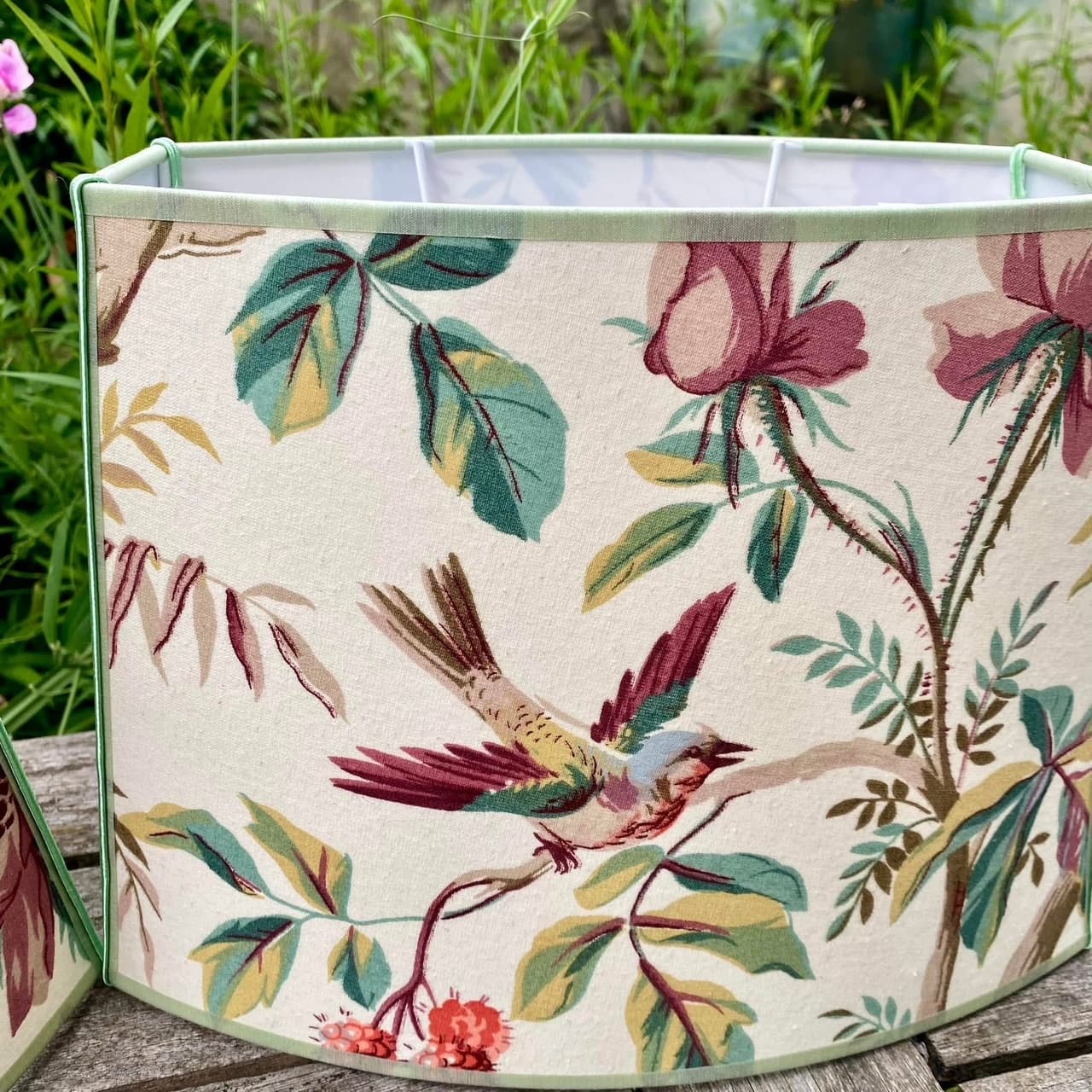 Multicoloured bird-patterned Indian fabric in green and plum, view 3